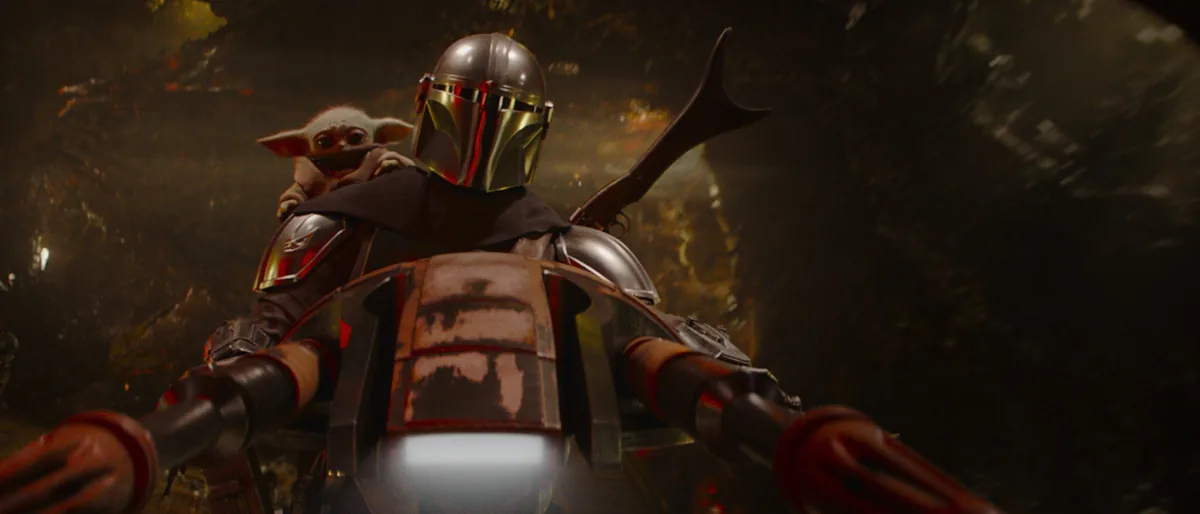 Mandalorian ve Grogu filmi — zırhlı Din Djarin ve minik Grogu birlikte aksiyon sahnesinde