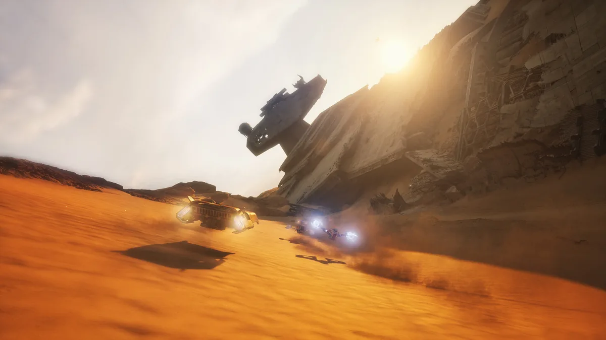 STAR WARS Galactic Racer oynanış sahnesi - Jakku çölünde iki landspeeder yan yana yüksek hızda yarışırken