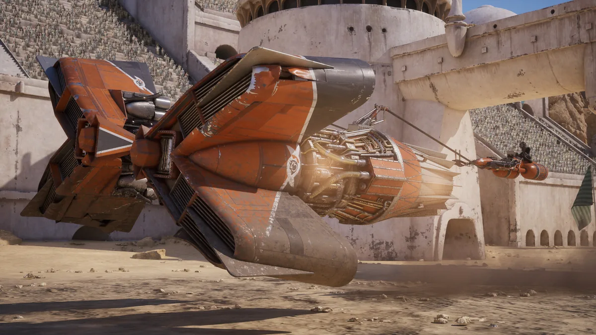 STAR WARS Galactic Racer podracer - dev motorlu yarış aracının Mos Espa tarzı arena pistinde aksiyon karesi