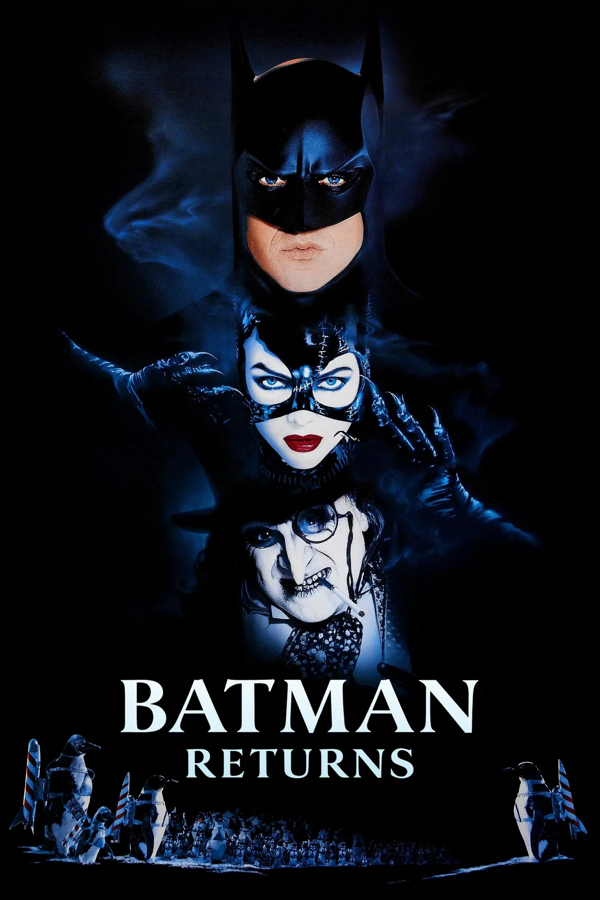 Batman Returns (1992) filminin resmi afişi; Michael Keaton'ın Batman'i, Michelle Pfeiffer'ın Catwoman'ı ve Danny DeVito'nun Penguin'i