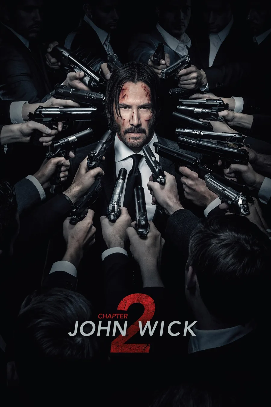 John Wick: Chapter 2 filminin resmi afişinde Keanu Reeves etrafını saran silahlarla çevrilmiş halde