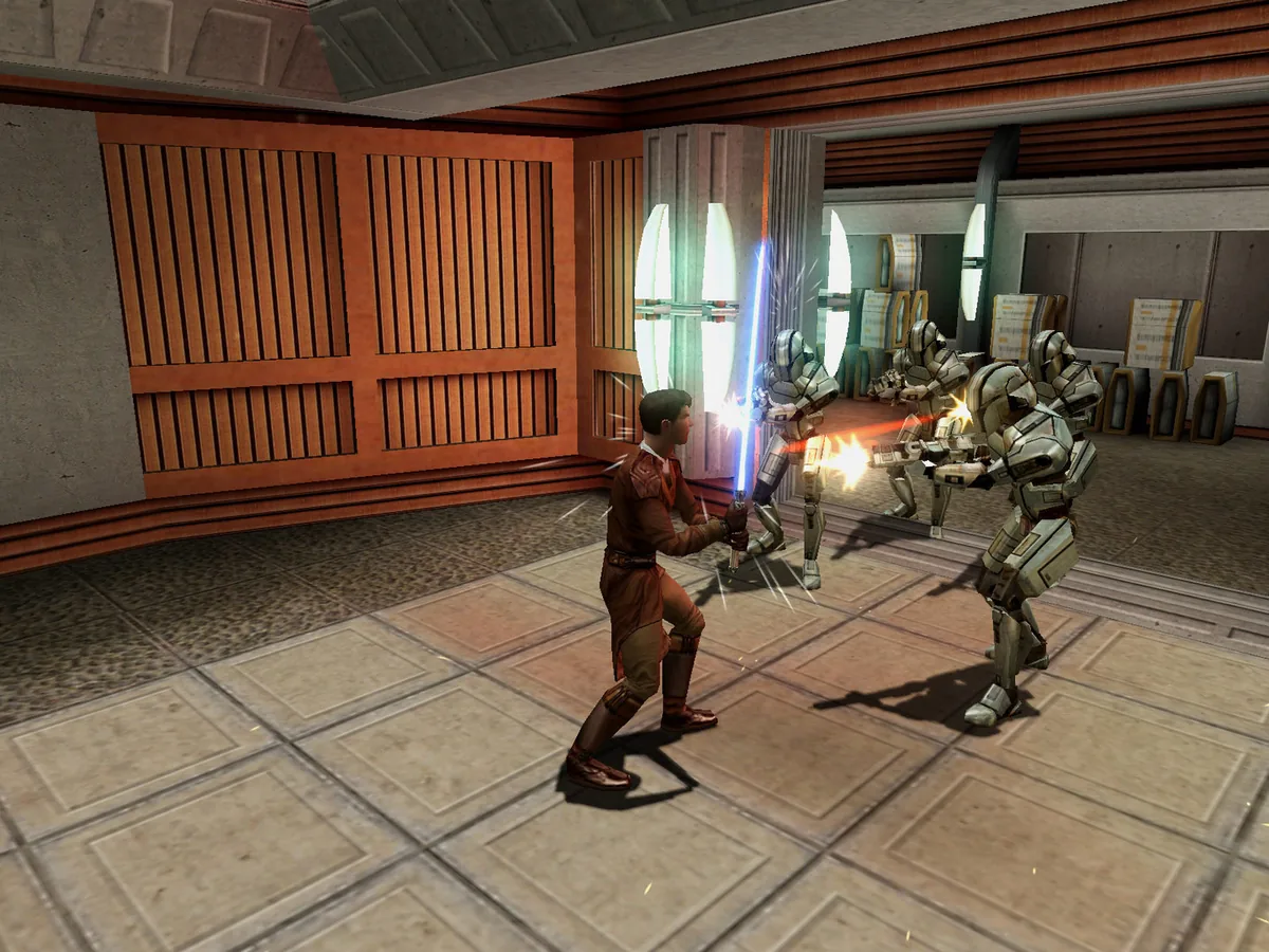 Star Wars Knights of the Old Republic oyununda ana karakter ışın kılıcıyla droid muhafızlara karşı düello yapıyor