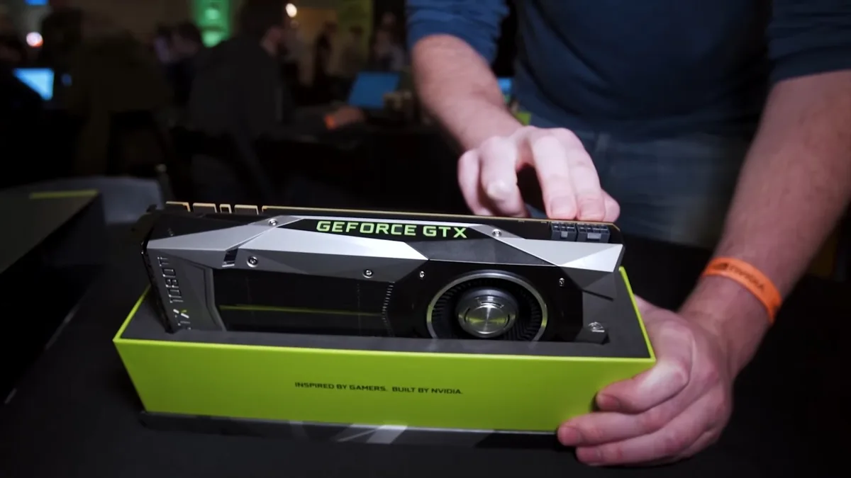 NVIDIA GeForce GTX 1080 Ti Founders Edition ekran kartı kutusuyla birlikte, tanıtım etkinliğinde