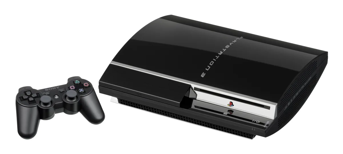 Sony PlayStation 3 (orijinal 2006 modeli, CECHA01) konsolu, dahili Blu-ray sürücüsüyle DualShock 3 kontrolcüsü yanında