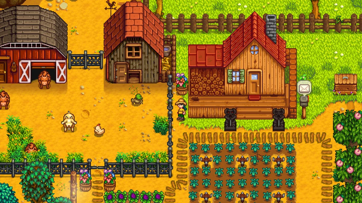 Stardew Valley resmi ekran görüntüsü: ahır, silo ve tavuklarla dolu pixel-art çiftlik evi manzarası