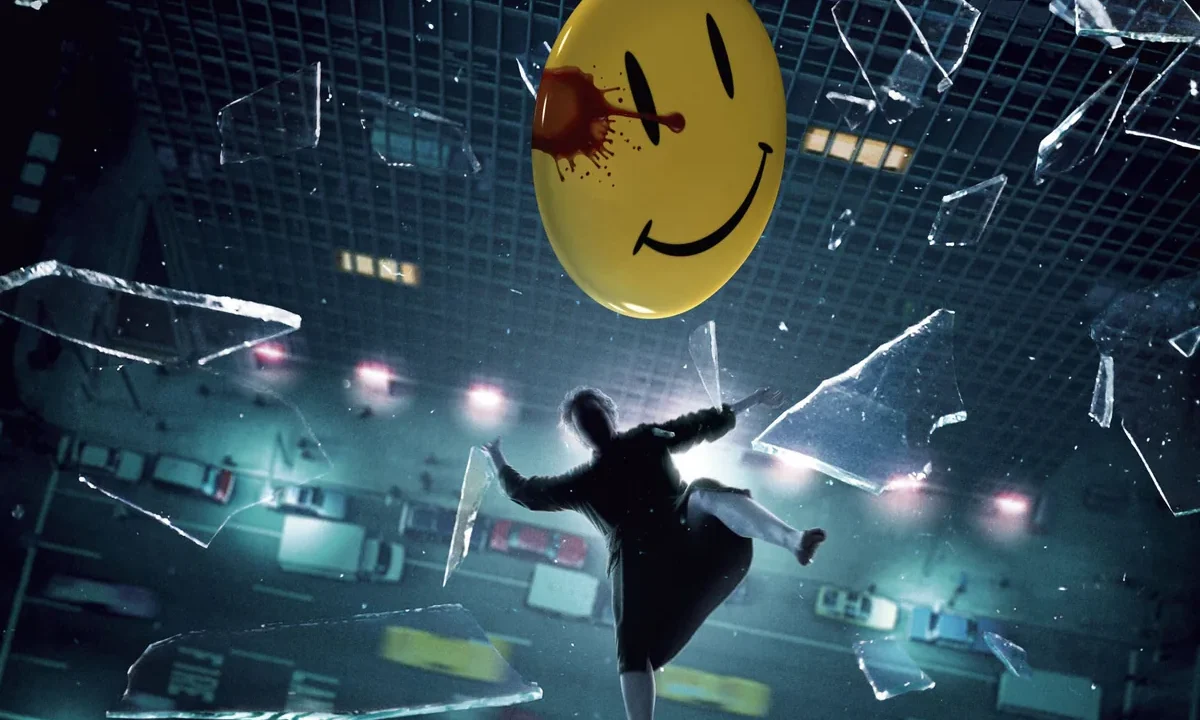 Watchmen filminin ikonik kan lekeli sarı gülen yüz (smiley) rozetini gösteren resmi afiş görseli